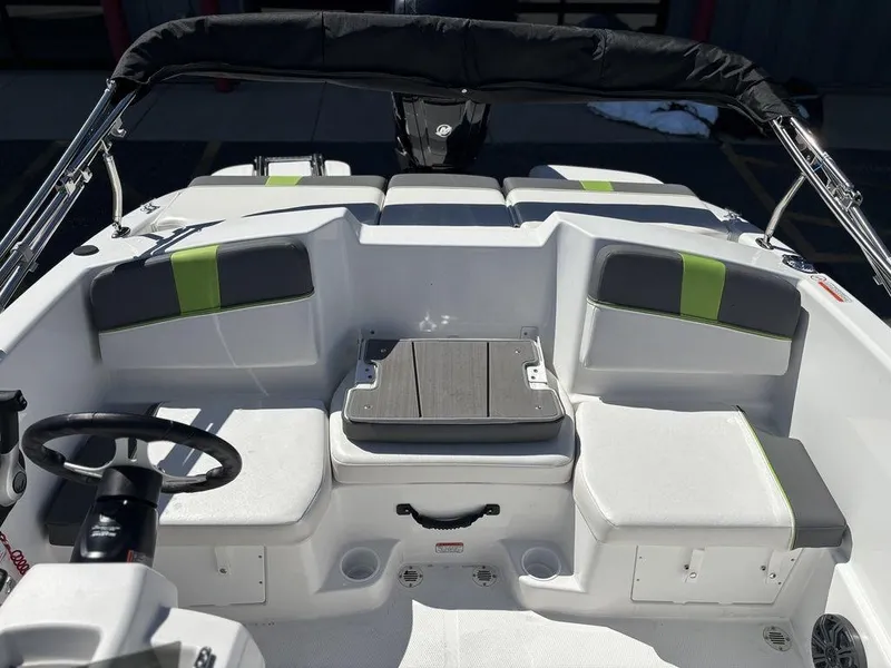 Slide: The Image of 2024 Tahoe T16 boat interior with seating and steering wheel, featuring modern design elements. - 15