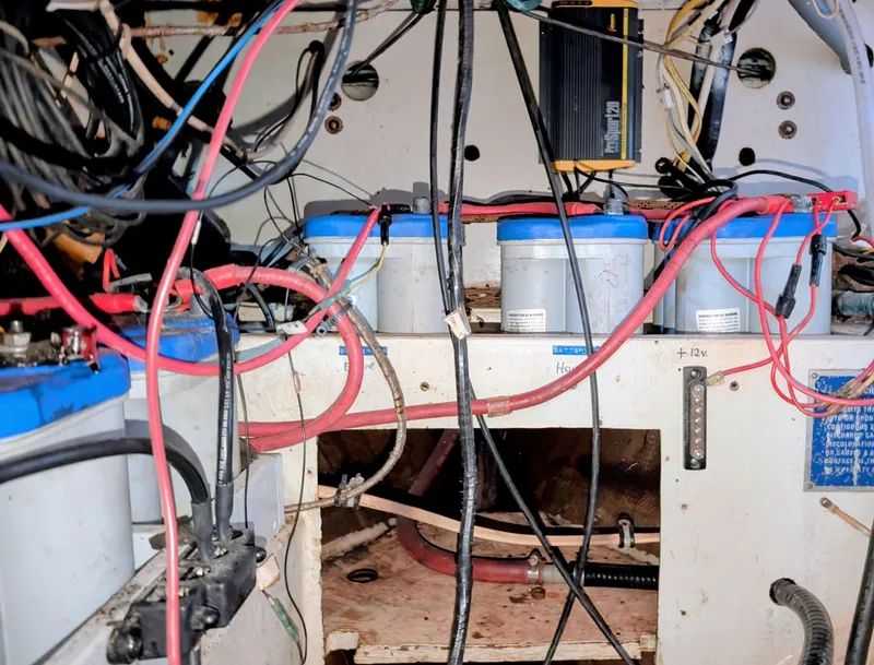 Slide: The Image of Electrical system of a 1975 Downeast Ketch with batteries and wiring. - 43