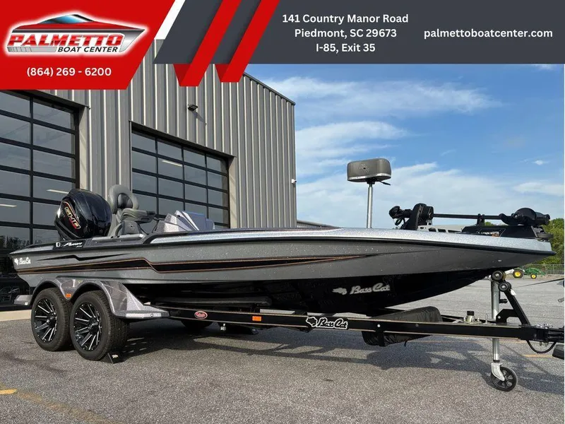 Slide: The Image of 2025 Bass Cat Puma STS boat on trailer at Palmetto Boat Center. - 1