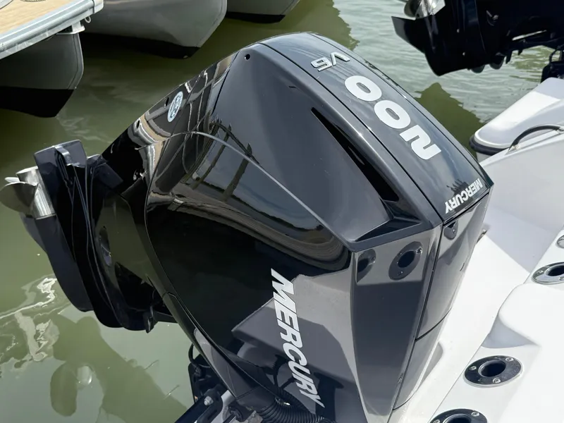 Slide: The Image of 2024 Aquasport 2200 Center Console with Mercury 400 V8 outboard engine. - 15