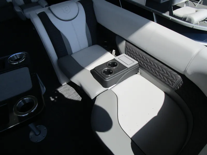 Slide: The Image of Interior seating of 2025 MONACO Monaco Cruise 235 C with cup holders. - 9