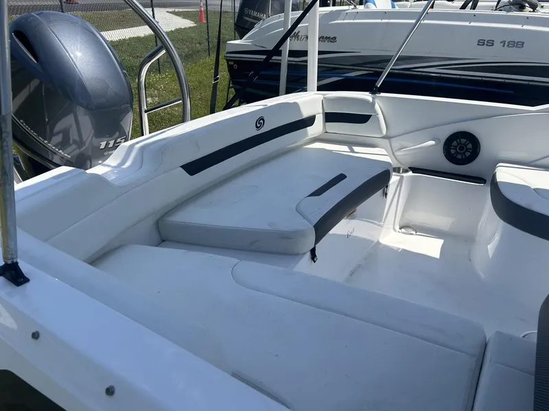 Slide: The Image of 2021 Hurricane SunDeck Sport 185 OB boat interior with seating and Yamaha outboard motor. - 3