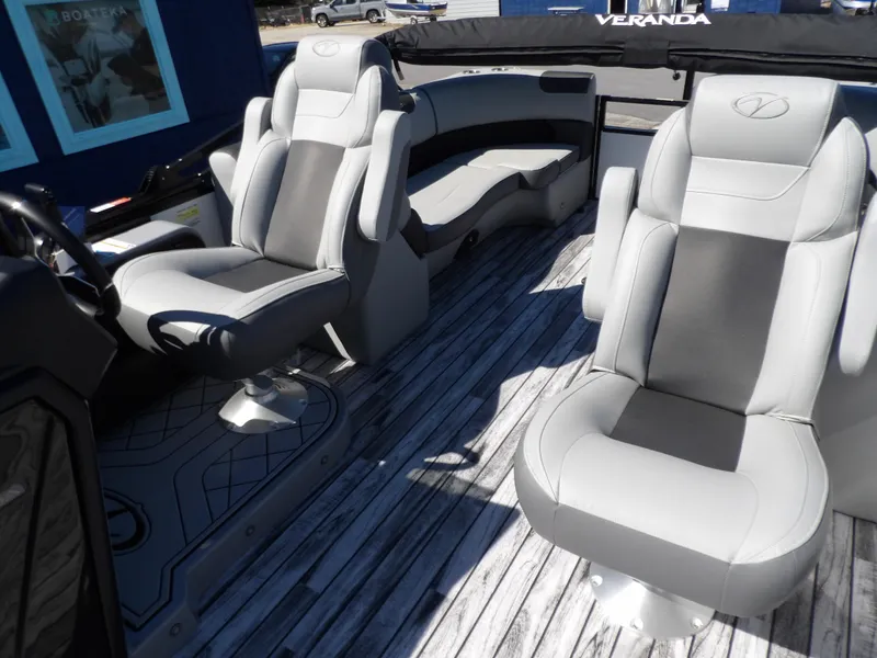 Slide: The Image of 2025 Veranda Relax 22 RC boat interior with plush seating and modern design. - 11