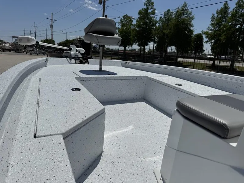Slide: The Image of 2023 Xpress H22 Bay boat with seating and fishing deck, parked outdoors. - 20