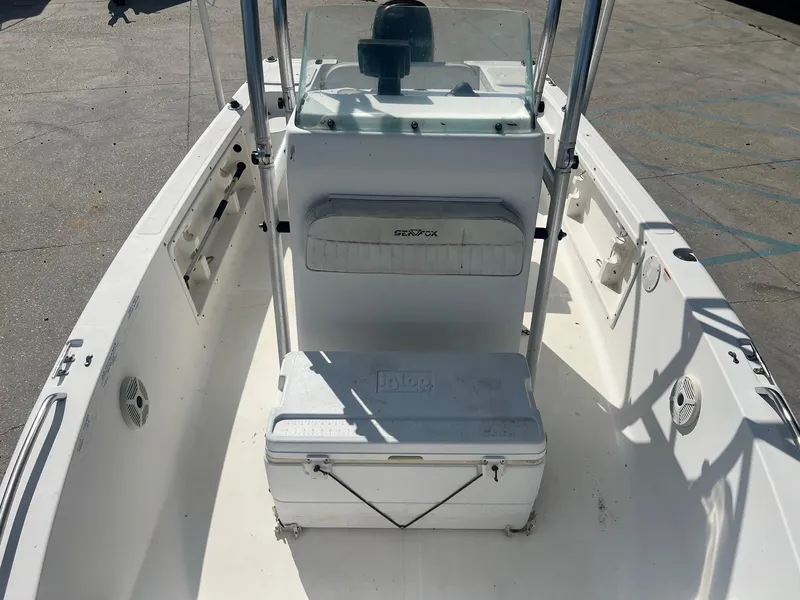 Slide: The Image of 2007 Sea Fox Pro Series Center Console 197 boat interior with cooler and seating. - 10