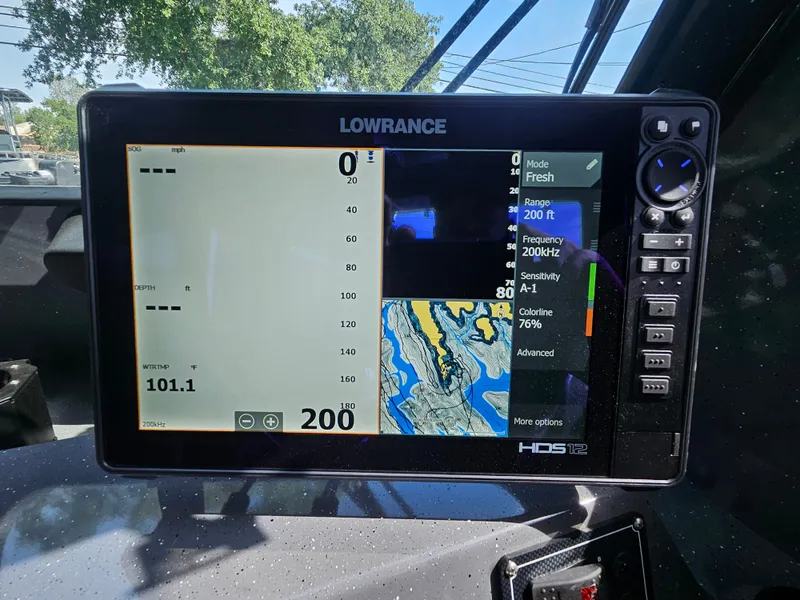 Slide: The Image of Lowrance HDS display on 2023 RH Boats 22 Coastal Hardtop, showing navigation and sonar data. - 15