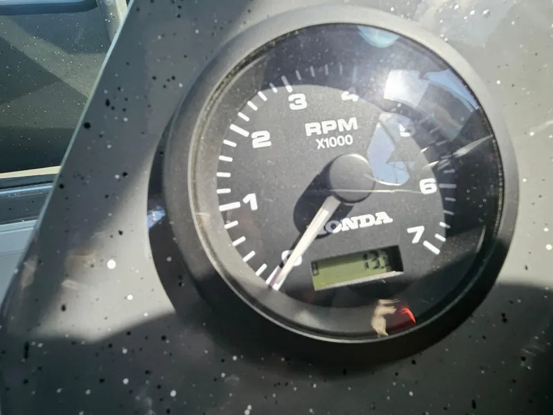 Slide: The Image of Tachometer of 2023 RH Boats 22 Coastal Hardtop showing RPM. - 29