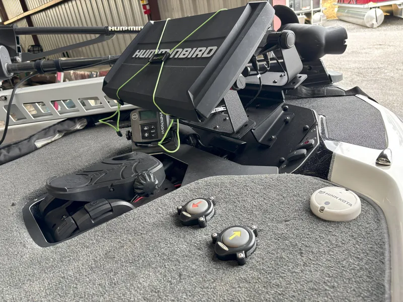 Slide: The Image of 2021 Skeeter ZXR21 boat with Humminbird electronics and Minn Kota foot pedal controls. - 19