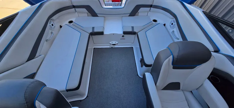 Slide: The Image of 2020 Yamaha Boats AR240 interior with spacious seating and modern design. - 10