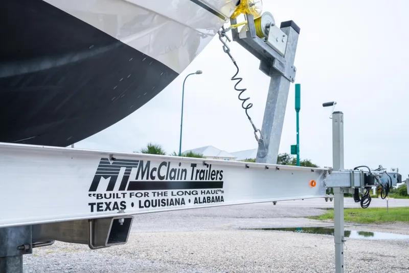 Slide: The Image of 2022 Sailfish 242 CC on McClain trailer, built for long hauls, Texas, Louisiana, Alabama. - 20