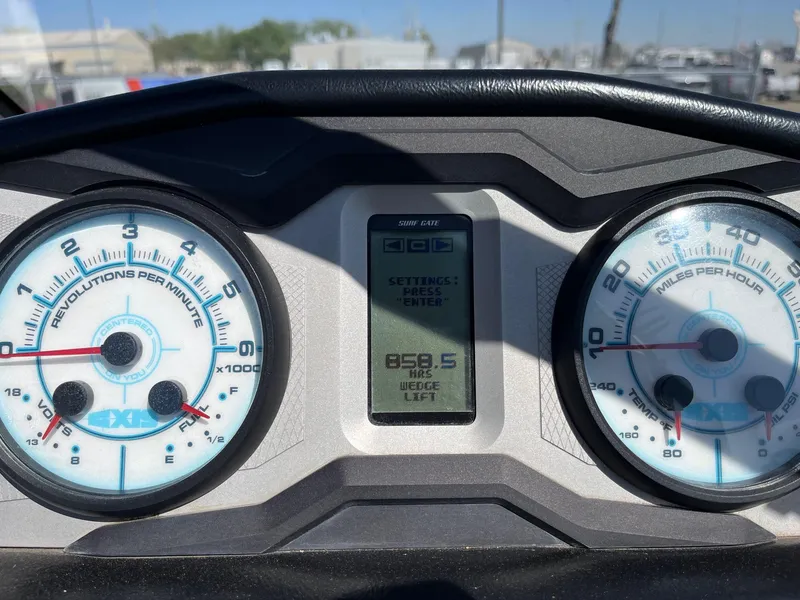 Slide: The Image of Dashboard of a 2021 Axis T22 boat showing RPM, speed, and settings display. - 31