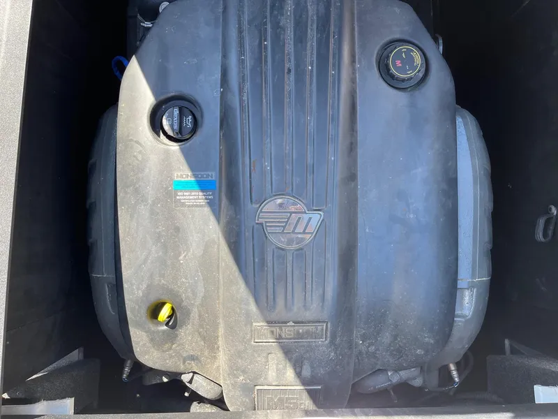 Slide: The Image of 2021 Axis T22 engine compartment with Monsoon motor, showcasing detailed components. - 35