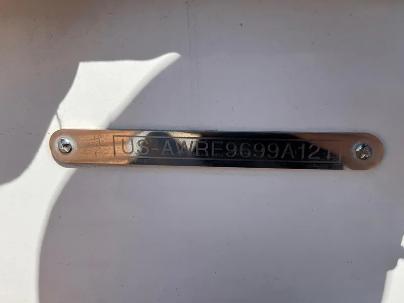 Slide: The Image of 2021 Axis T22 boat identification plate with serial number. - 38