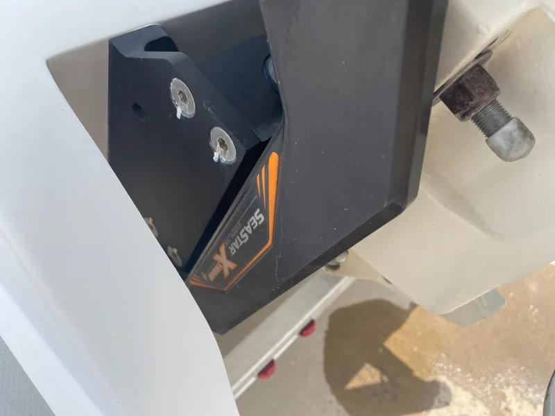 Slide: The Image of Close-up of a 2020 Shallow Sport 18 Sport boat component with SeaStar hydraulic steering. - 13