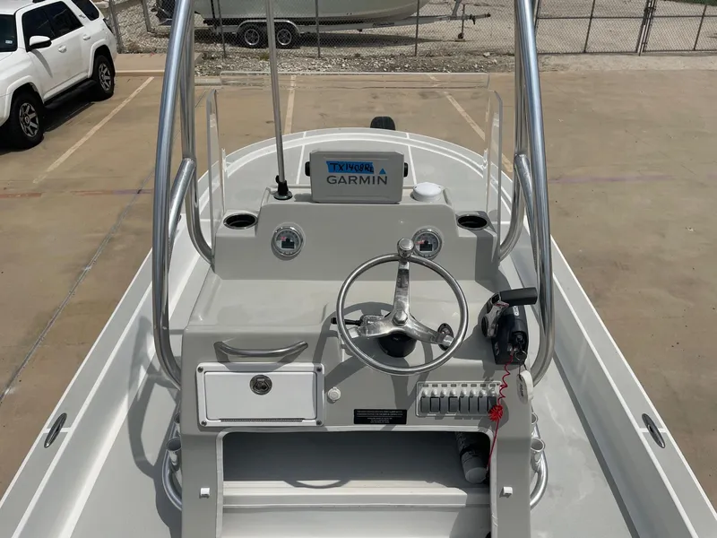 Slide: The Image of 2020 Shallow Sport 18 Sport boat dashboard with Garmin navigation system. - 22