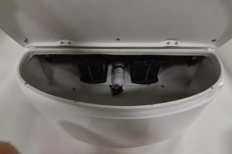 Slide: The Image of Open storage compartment in 2013 Chaos 21 Tarpon Bay boat. - 28