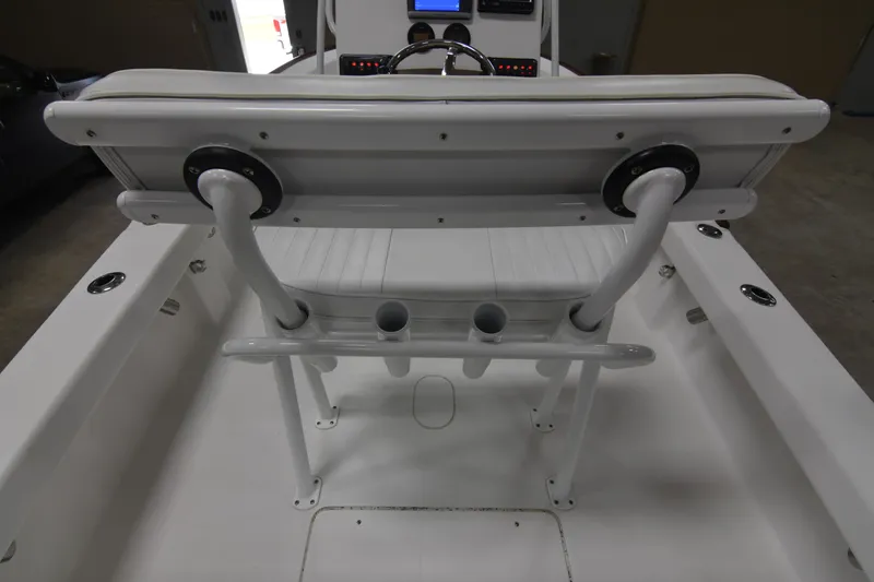 Slide: The Image of 2013 Chaos 21 Tarpon Bay boat interior with steering console and seating. - 37