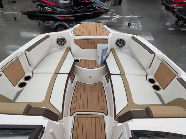 Slide: The Image of 2023 Yamaha Boats 222SD interior with spacious seating and modern design. - 10