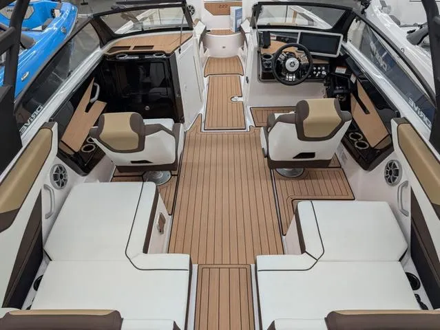Slide: The Image of 2023 Yamaha Boats 222SD interior with spacious seating and modern dashboard design. - 3