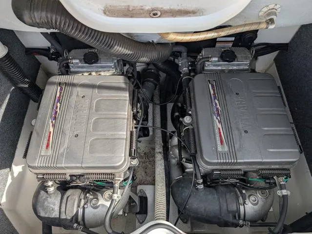 Slide: The Image of 2009 Yamaha Boats SX 230 engine compartment with dual engines and visible components. - 16
