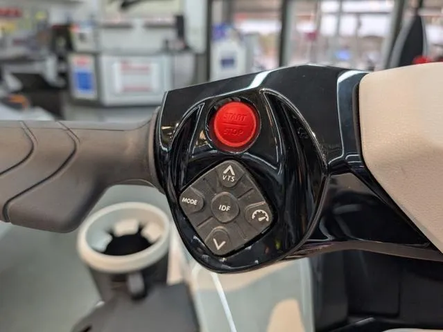 Slide: The Image of 2024 Sea-Doo Waverunner Fishpro Scout 130 handlebar controls with start/stop button and mode settings. - 7