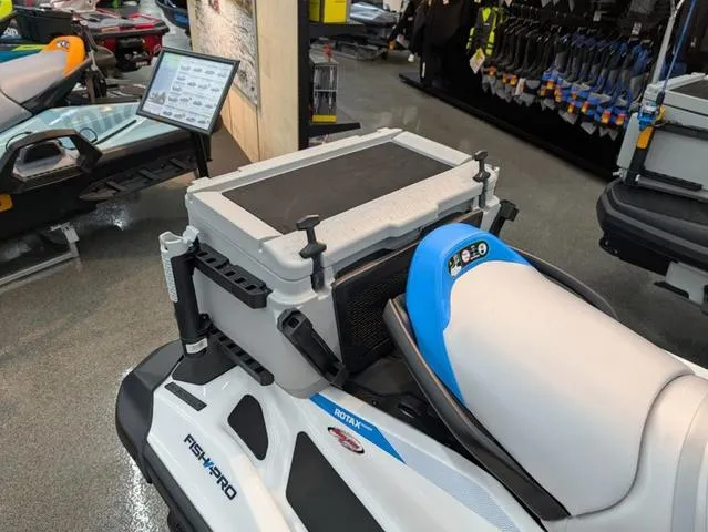 Slide: The Image of 2024 Sea-Doo Waverunner Fishpro™ Scout 130 with storage box in showroom display. - 8