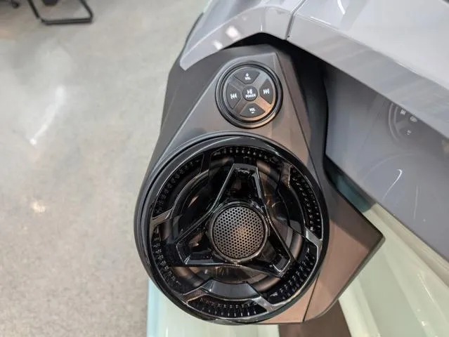 Slide: The Image of 2024 Sea-Doo Waverunner Wake speaker system with control buttons, close-up view. - 5