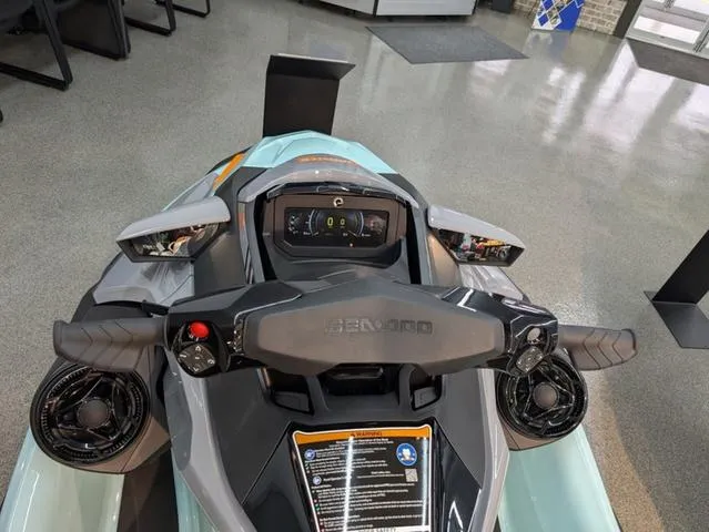 Slide: The Image of 2024 Sea-Doo Waverunner Wake dashboard and controls in showroom setting. - 6
