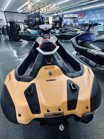 Slide: The Image of 2024 Sea-Doo Spark Waverunner in showroom, showcasing sleek design and advanced features. - 5