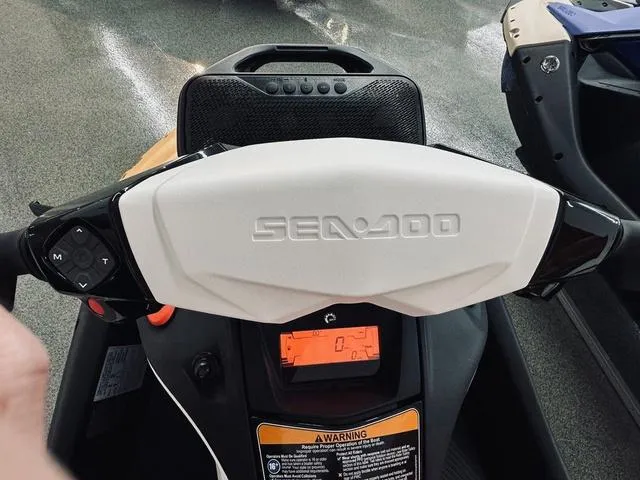 Slide: The Image of 2024 Sea-Doo Waverunner Spark dashboard with digital display and controls. - 6