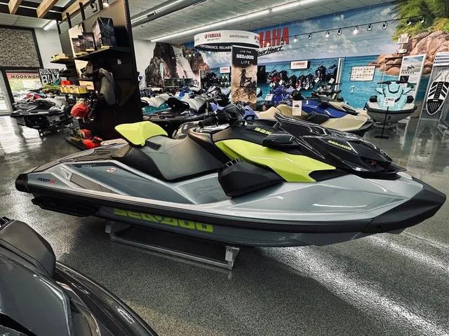 Slide: The Image of 2025 Sea-Doo Waverunner RXP-X™ 325 in ice metal with neon accents, side view. - 1
