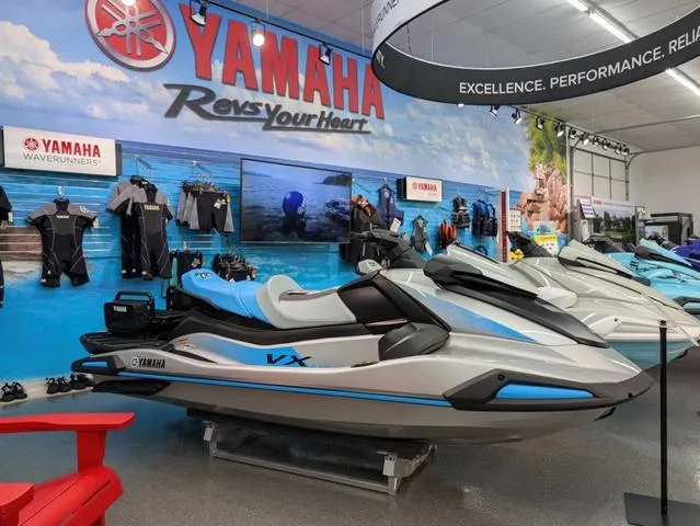 Slide: The Image of 2024 Yamaha WaveRunner VX displayed in showroom with vibrant branding and accessories. - 3