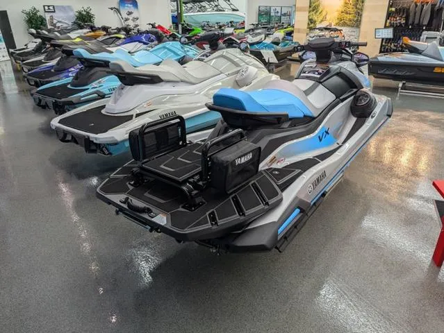 Slide: The Image of 2024 Yamaha WaveRunner VX jet skis displayed in a showroom, featuring sleek design and vibrant colors. - 5