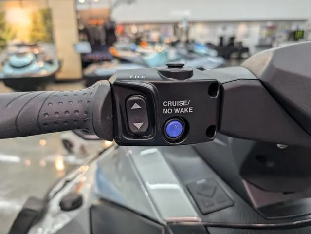 Slide: The Image of 2024 Yamaha WaveRunner VX handlebar controls with cruise and no wake buttons. - 8