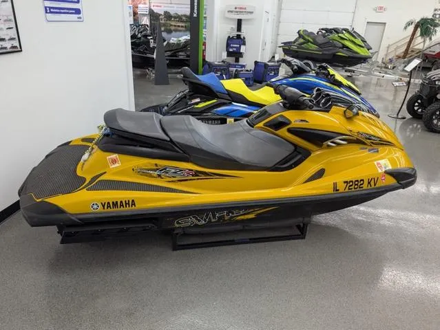 Slide: The Image of 2024 Yamaha WaveRunner FX Limited SVHO with Audio System, sleek black and orange design. - 1