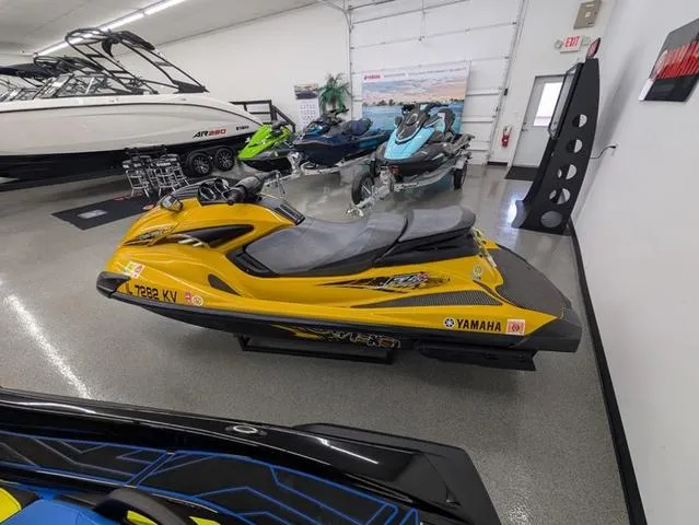 Slide: The Image of 2014 Yamaha WaveRunner FZS® in showroom, yellow and black, side view. - 6