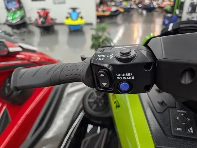 Slide: The Image of 2024 Yamaha WaveRunner FX Cruiser SVHO handlebar controls in showroom setting. - 7