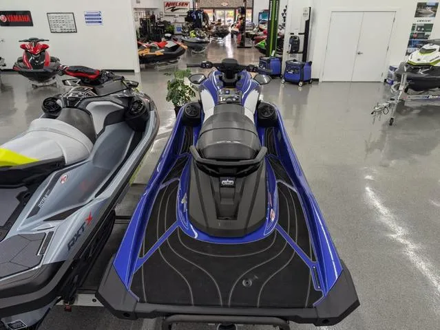 Slide: The Image of 2024 Yamaha WaveRunner GP SVHO with Audio, blue, displayed in showroom. - 3