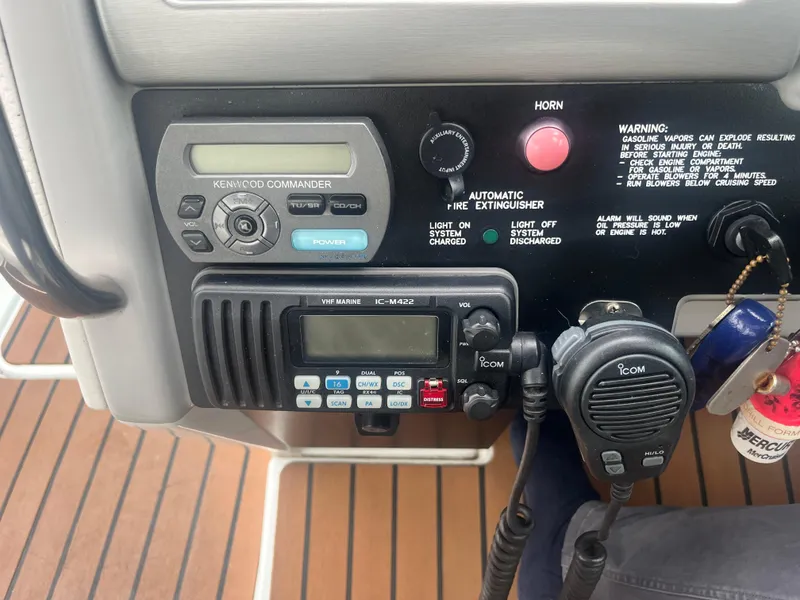 Slide: The Image of Control panel of a 2008 Formula 310 Bowrider with radio and fire extinguisher system. - 16