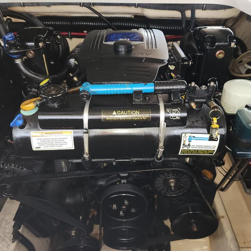 Slide: The Image of Engine of a 2008 Formula 310 Bowrider boat, detailed view. - 19