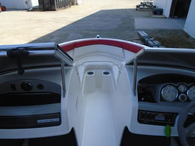 Slide: The Image of 2013 Bayliner 185 Bowrider dashboard with steering wheel and instrument panel. - 13