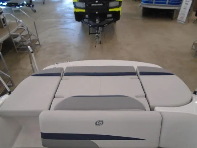 Slide: The Image of 2023 Hurricane SunDeck Sport 188 IO boat interior with cushioned seating. - 9