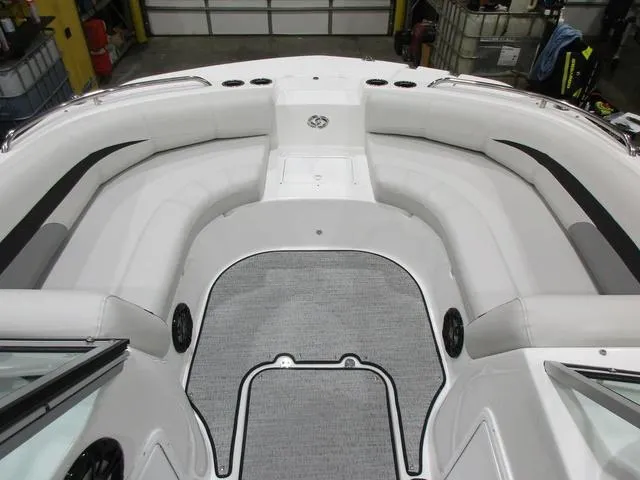 Slide: The Image of 2023 Hurricane SunDeck 187 IO boat interior with spacious seating and modern design. - 5