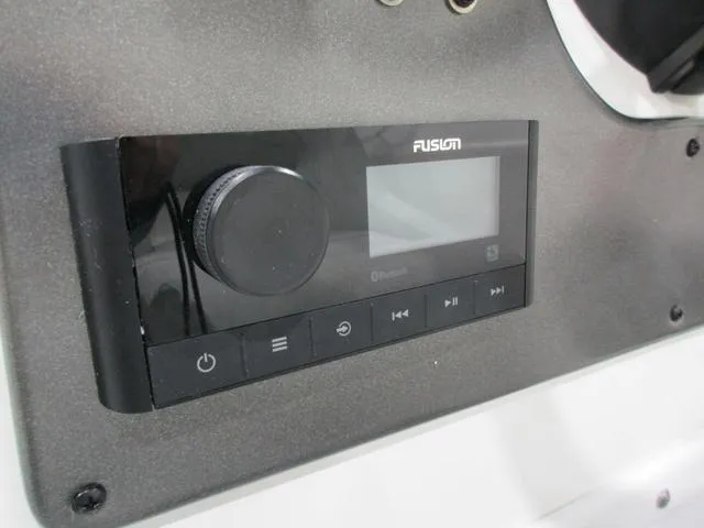 Slide: The Image of Fusion audio system on 2023 Hurricane SunDeck 187 IO boat dashboard. - 9