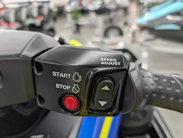 Slide: The Image of 2022 Yamaha WaveRunner FX Limited SVHO handlebar controls with start, stop, and speed adjust buttons. - 6