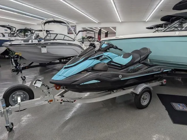 Slide: The Image of 2022 Yamaha WaveRunner FX Cruiser HO with Audio System on trailer in showroom. - 1