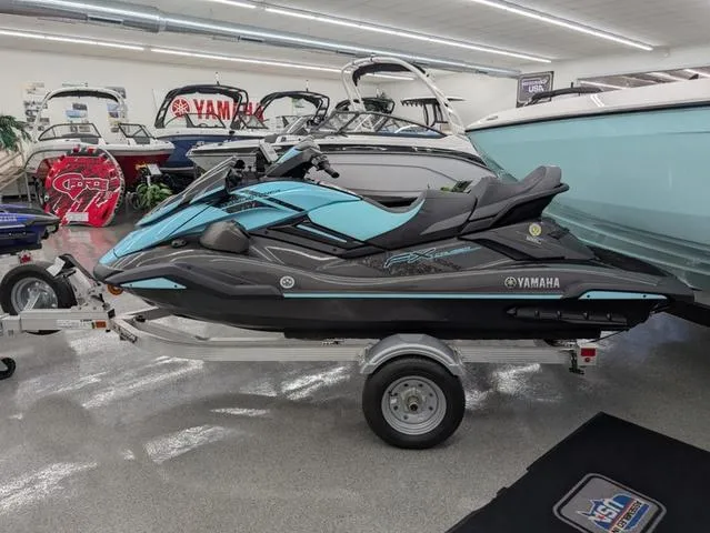 Slide: The Image of 2022 Yamaha WaveRunner FX Cruiser HO with Audio System in showroom, on trailer. - 2