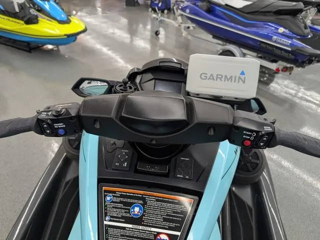 Slide: The Image of 2022 Yamaha WaveRunner FX Cruiser HO dashboard with Garmin system, featuring audio controls. - 5