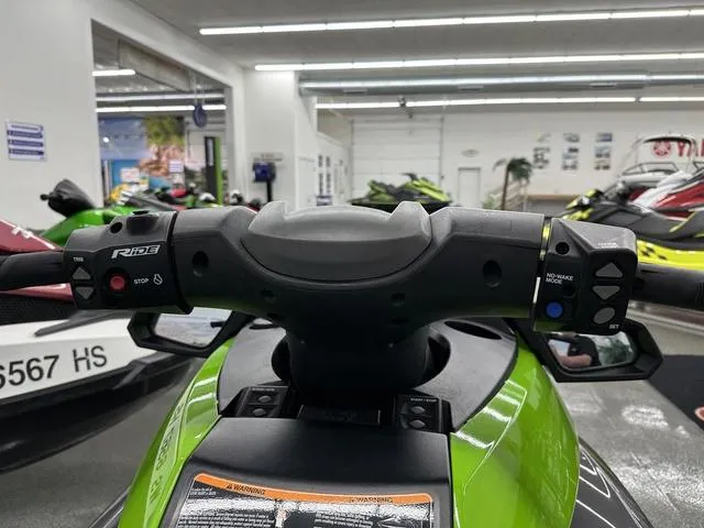 Slide: The Image of 2016 Yamaha WaveRunner FX SVHO handlebars in a showroom, featuring control buttons. - 6