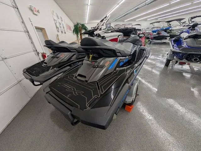 Slide: The Image of 2020 Yamaha WaveRunner FX Limited SVHO in showroom, sleek black design, side view. - 2
